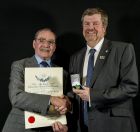 Stan Green (left) receiving the Scottish Horticultural Medal.